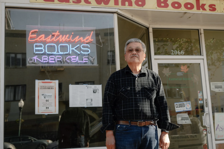 Image of Harvey Dong in front of Eastwind Books of Berkeley
