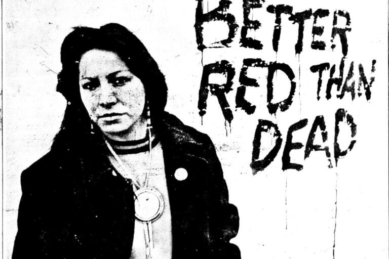 Stylized graphic of LaNada War Jack, next to her it says "Better Red Than Dead".