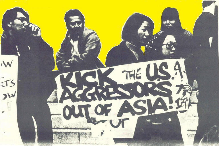 A group of AAPA members holding a protest sign
