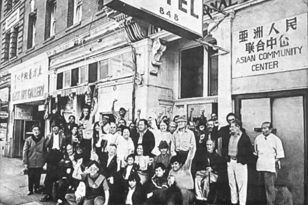 Advocates posing in solidarity in front of International Hotel